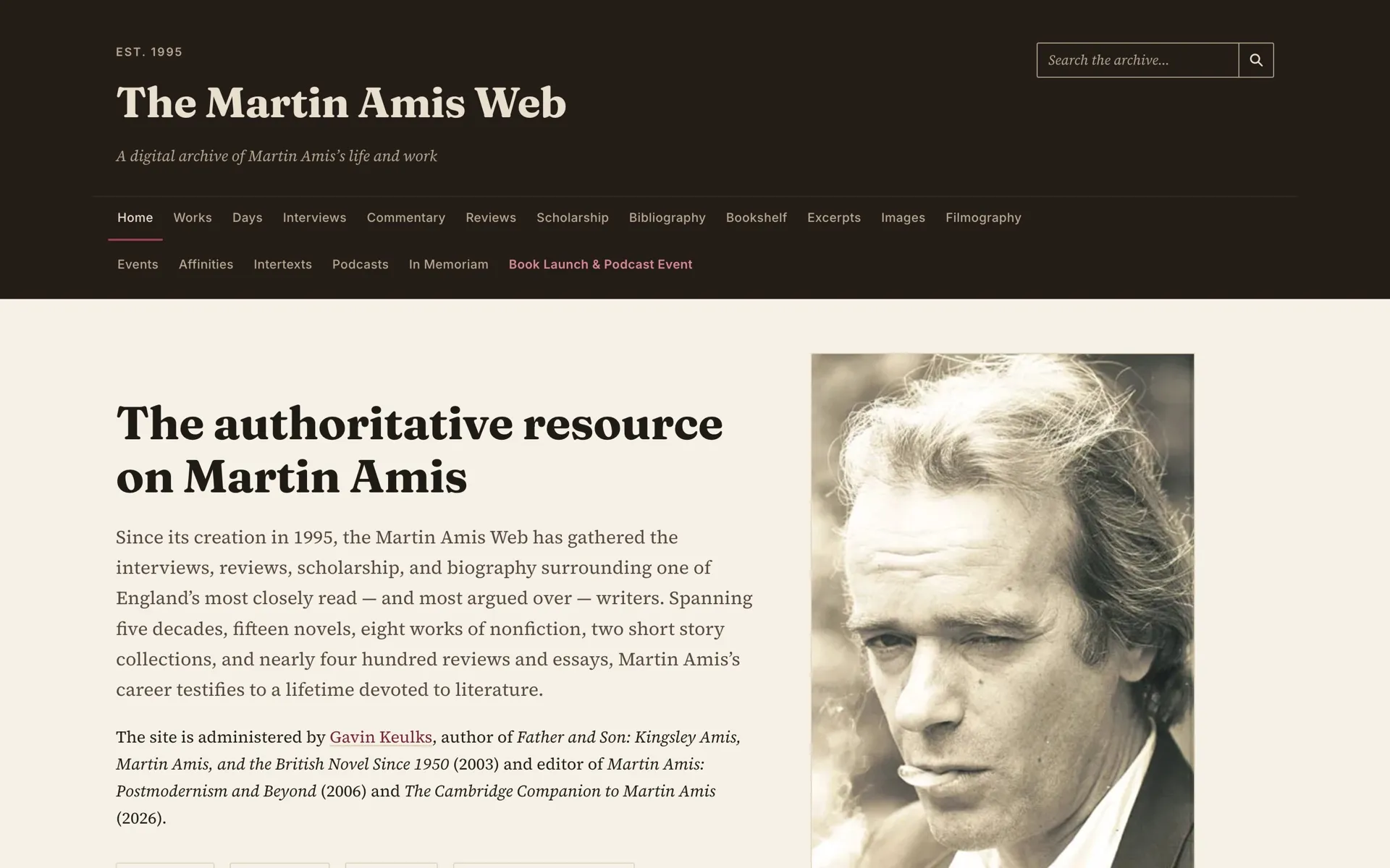 The Martin Amis Web home page in 2026: a dark header with the site's title and navigation, above an introduction and a black-and-white portrait of Martin Amis